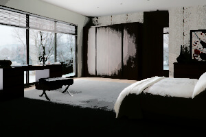 A modern bedroom with a large window displaying a snowy scene outside. The room features a bed with a white comforter, a black bench, a dark wood desk, and a wardrobe. The walls have subtle patterned wallpaper, and theres a piece of abstract art.